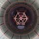 From Nature: “The fiber shroud of the liquid argon veto and the copper head for mounting the germanium strings. View from bottom.” Image: V. Wagner, GERDA collaboration